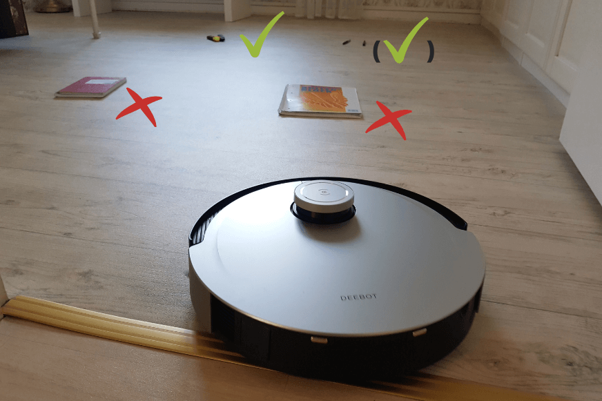 Ecovacs Deebot X1 OMNI object detection test of notebooks and pens. 